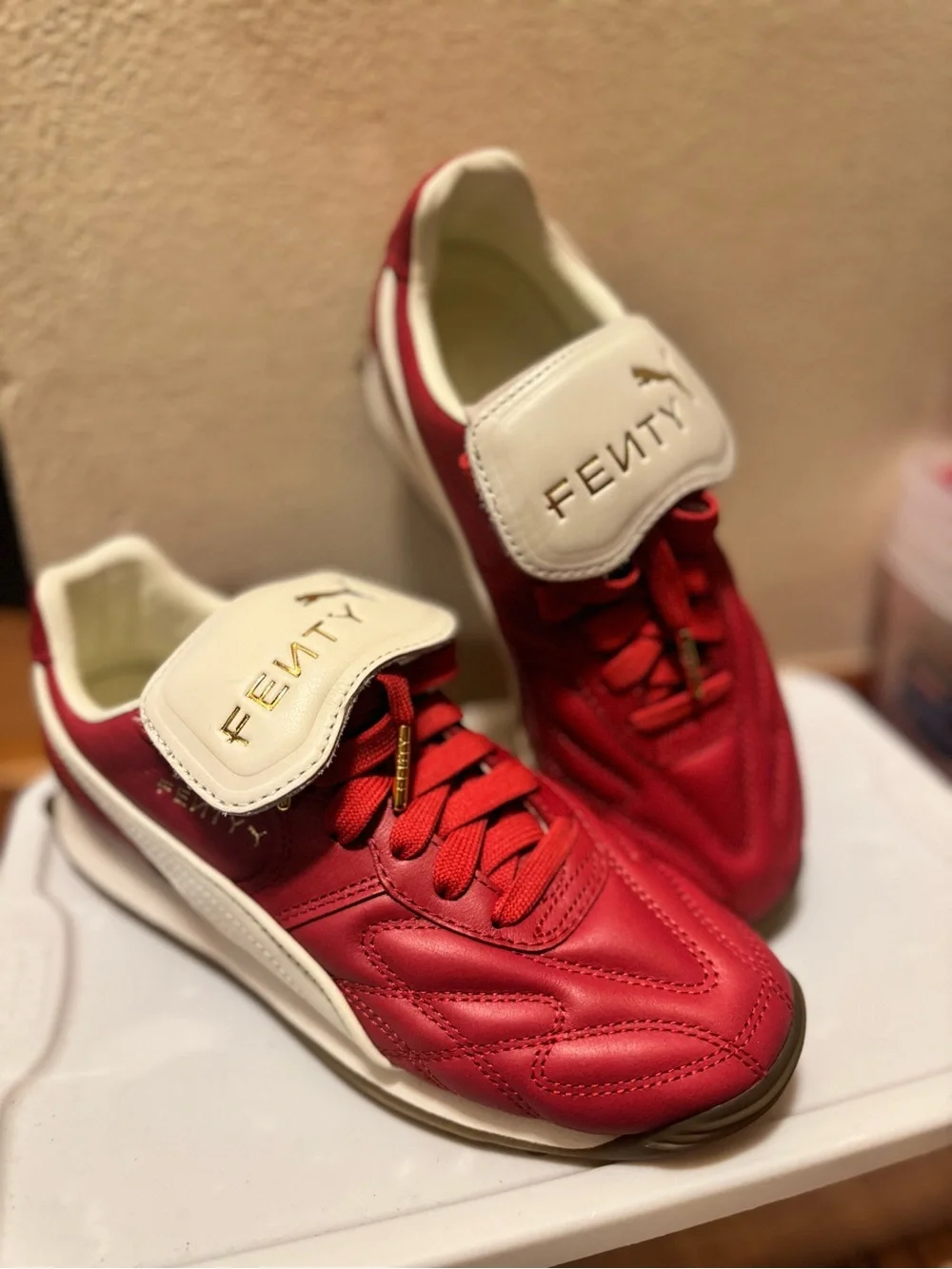 FENTY Red & White Women's Sneakers with Gold Logo Detail